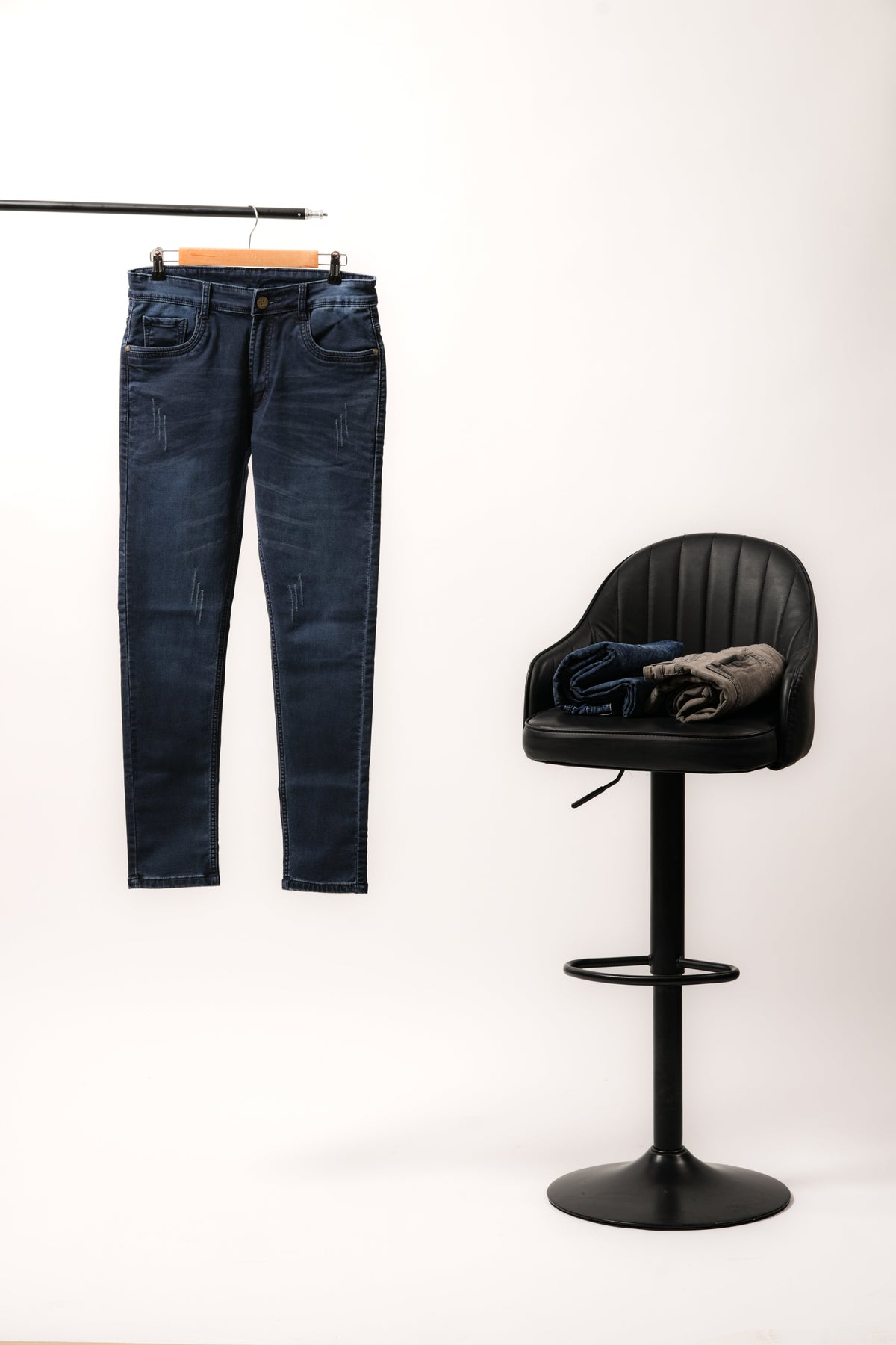 MEN SLIM FIT MILDLY DISTRESSED JEANS